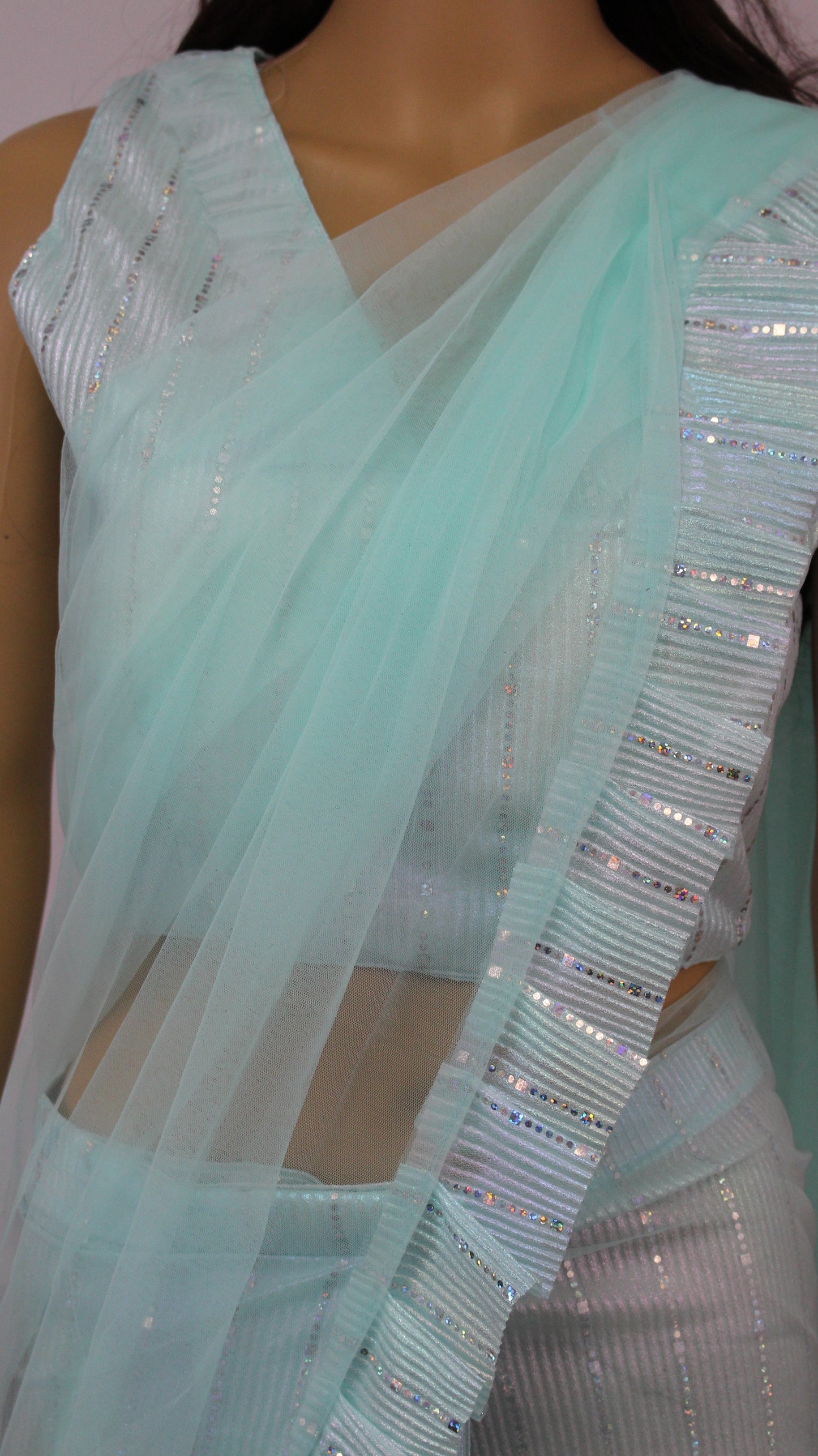 Aqua/Mint colored softnet saree