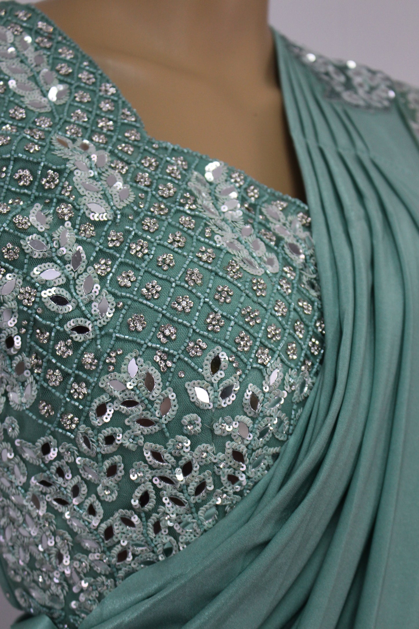 Exquisitely Handcrafted Sarees in Pine Green & Desert Rose