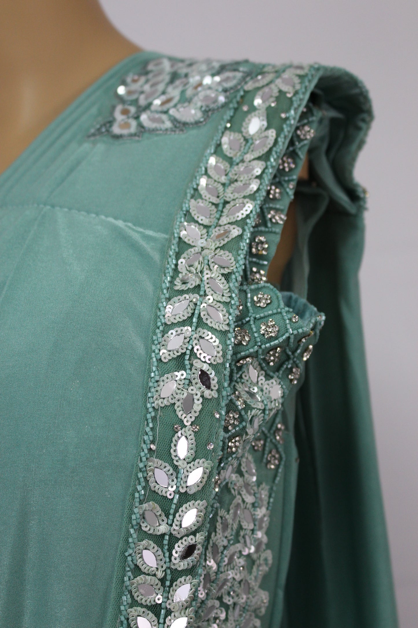 Exquisitely Handcrafted Sarees in Pine Green & Desert Rose